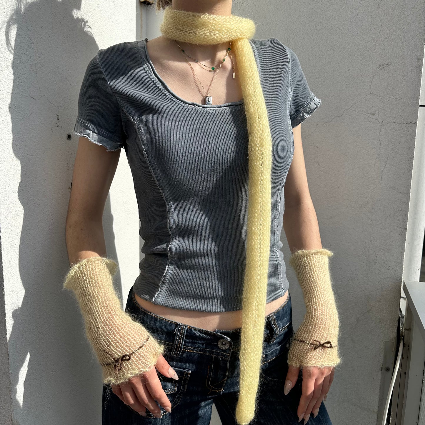 Handmade knitted mohair skinny scarf in light yellow