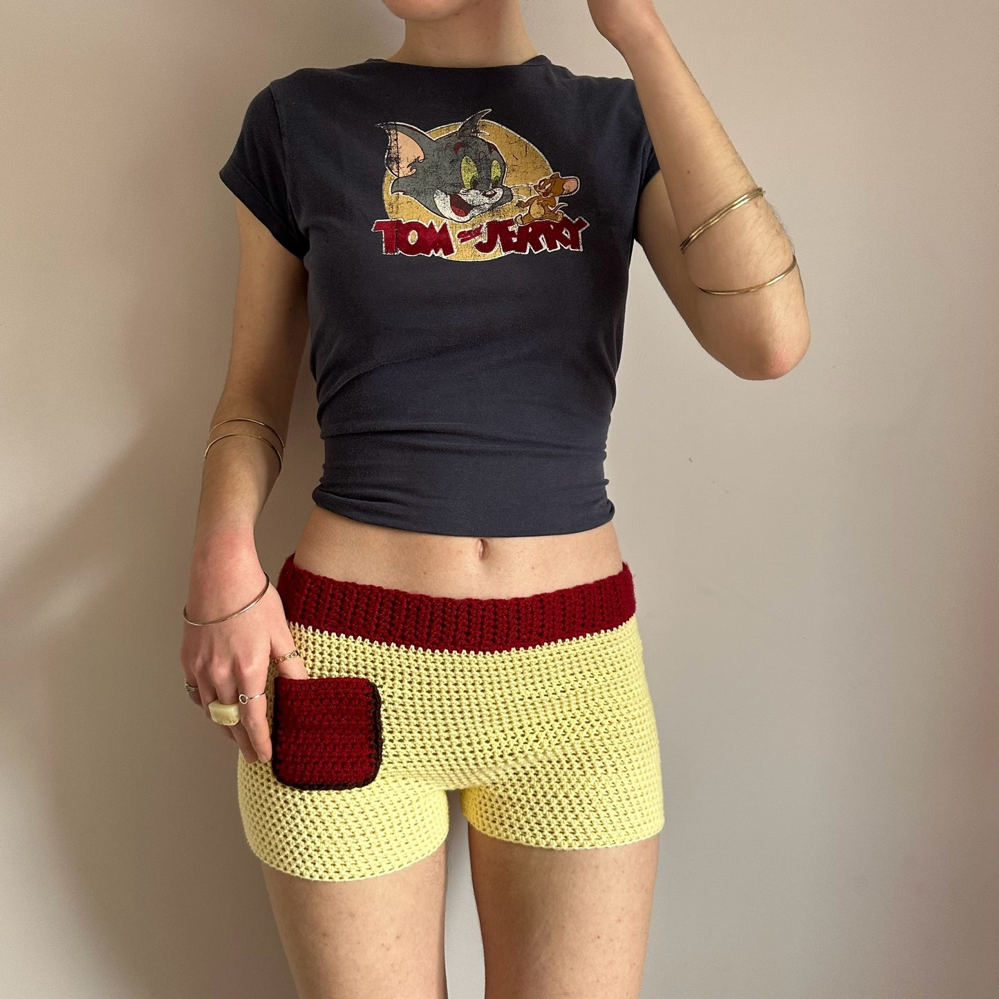 Handmade crochet shorts in pastel yellow, dark red and brown with pocket