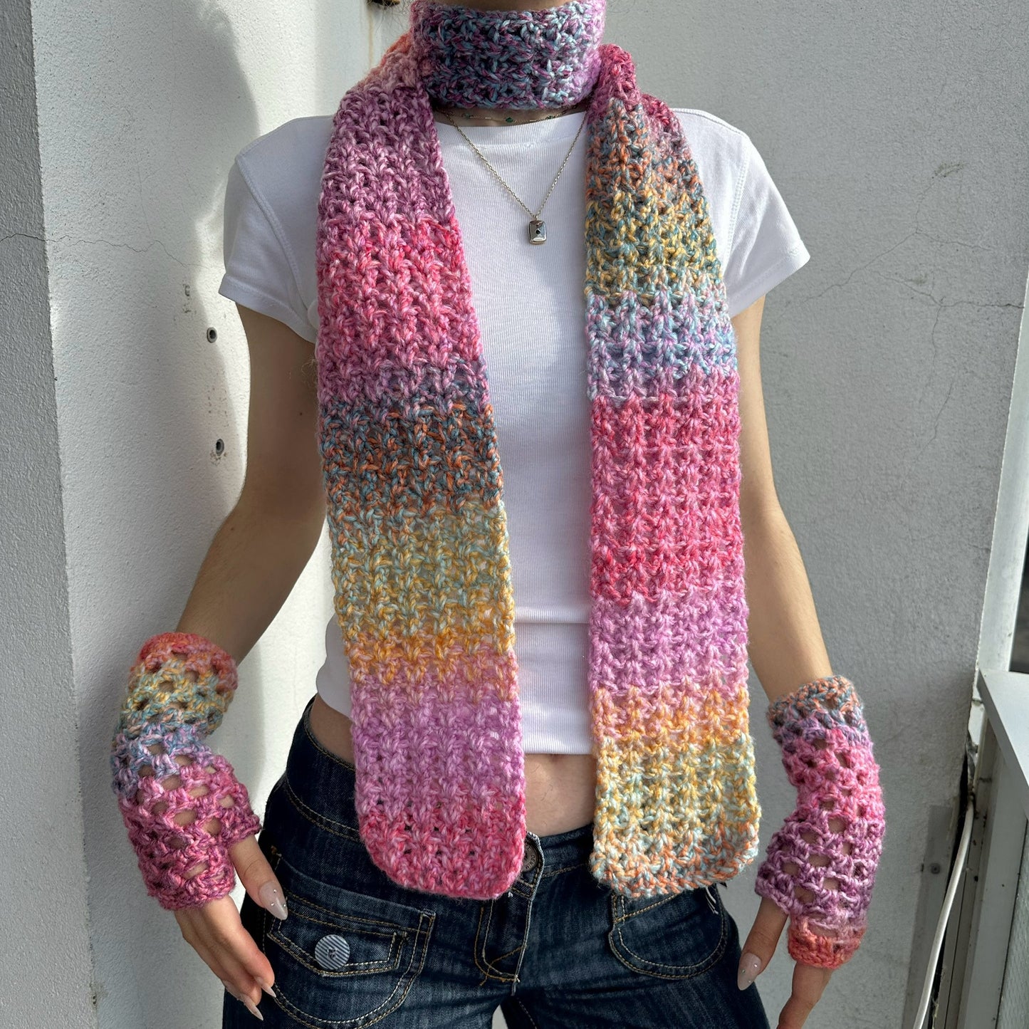 Handmade multicoloured ombré crochet scarf in pink, purple, orange and yellow