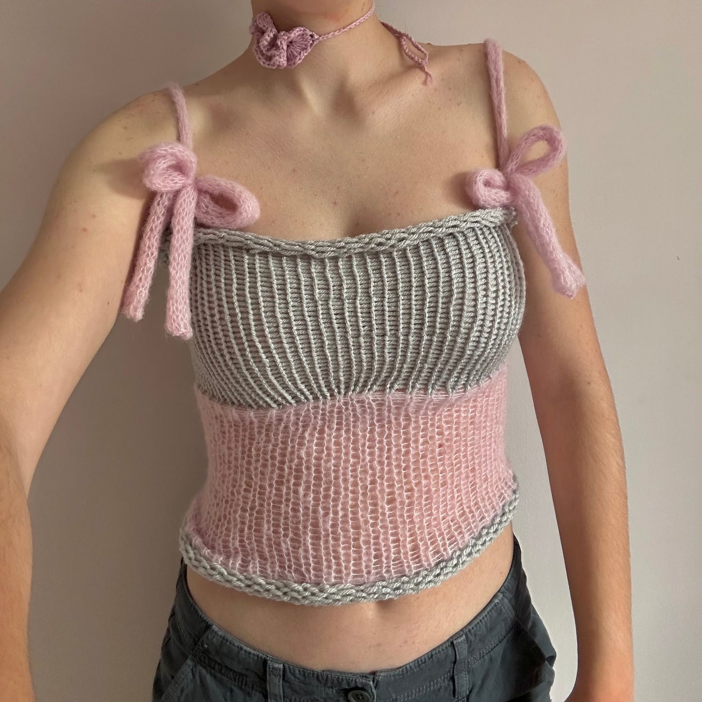 Handmade knitted mohair bow top in light grey and baby pink