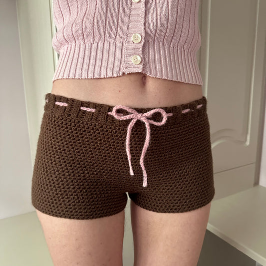 Handmade brown crochet shorts with baby pink bow