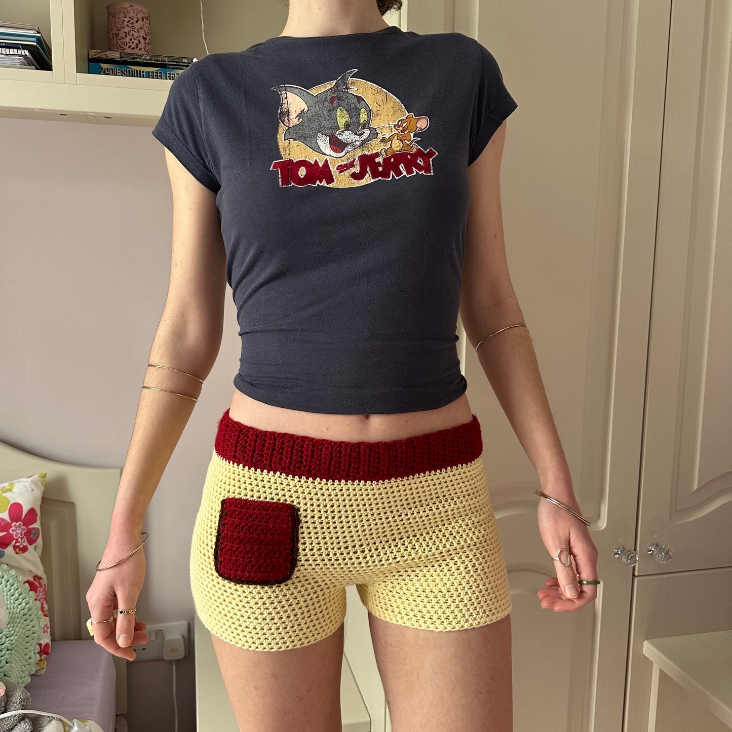 Handmade crochet shorts in pastel yellow, dark red and brown with pocket