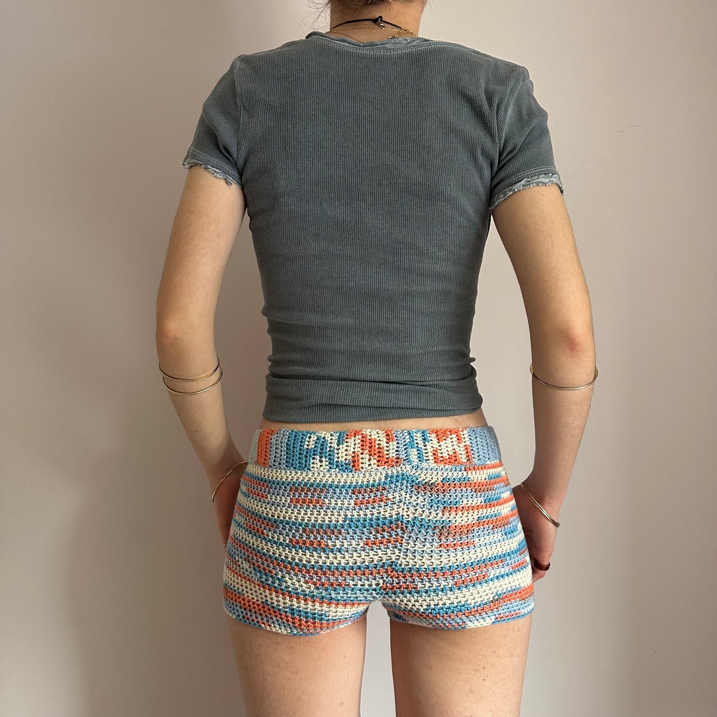 Handmade orange, white and blue striped crochet shorts