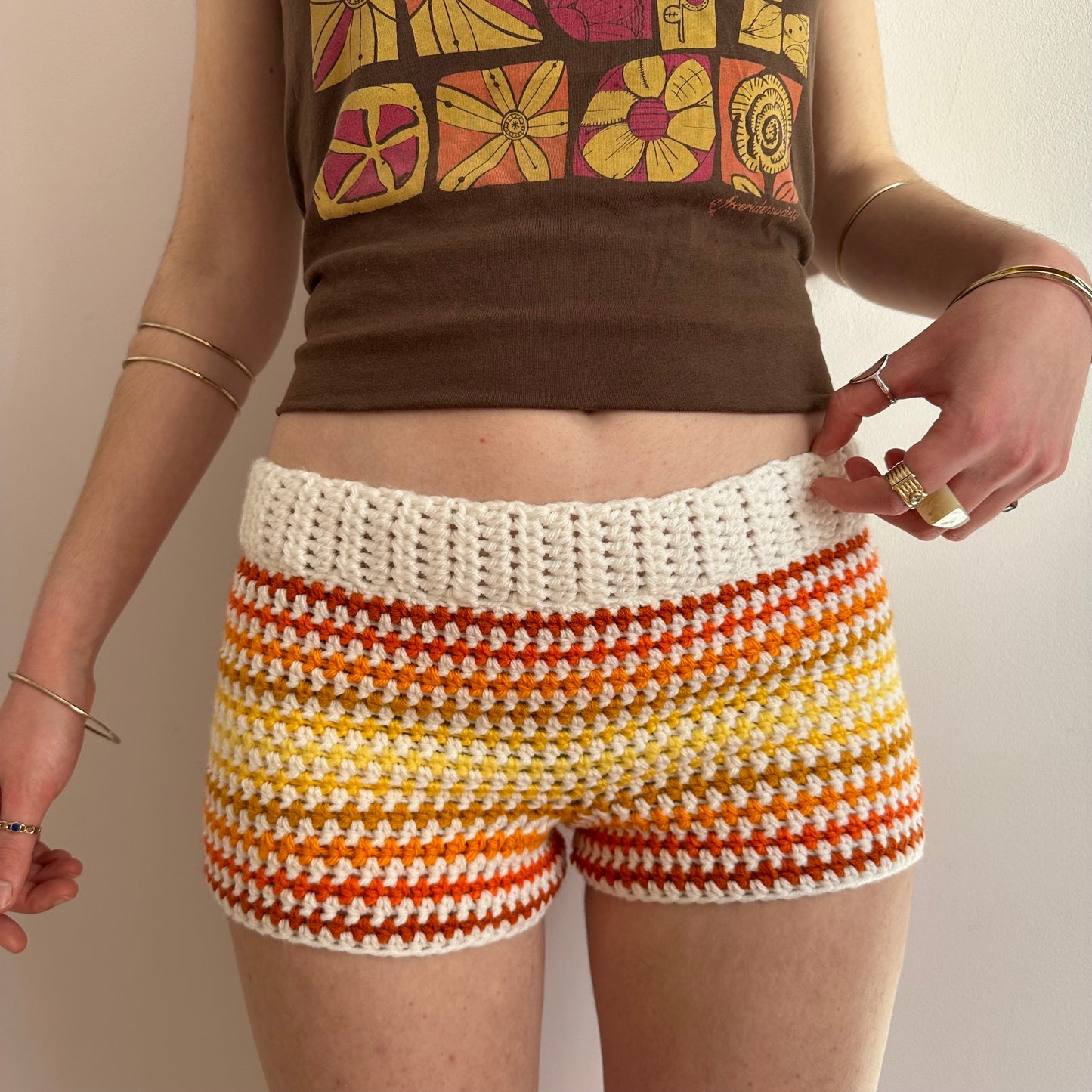 Handmade white, orange and yellow ombré striped crochet shorts