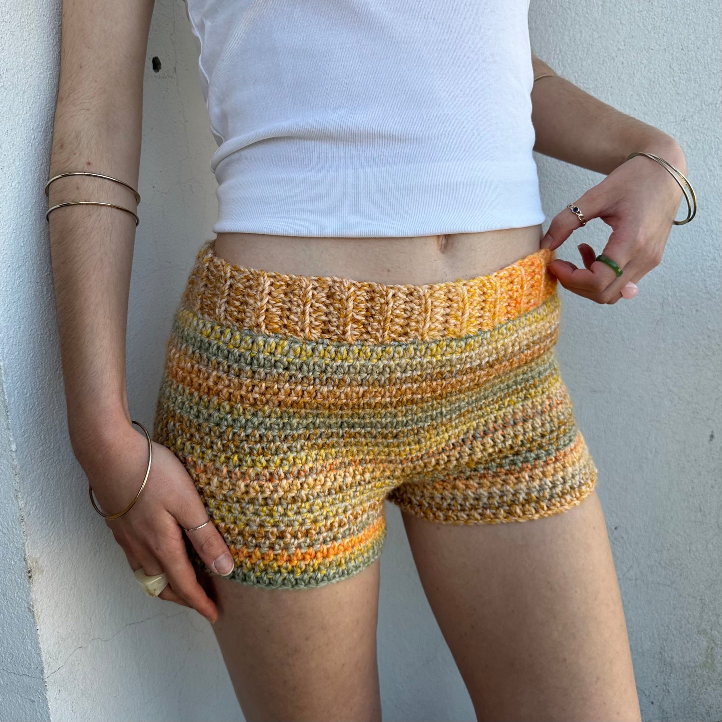 Handmade grey, yellow and orange ombré striped crochet shorts