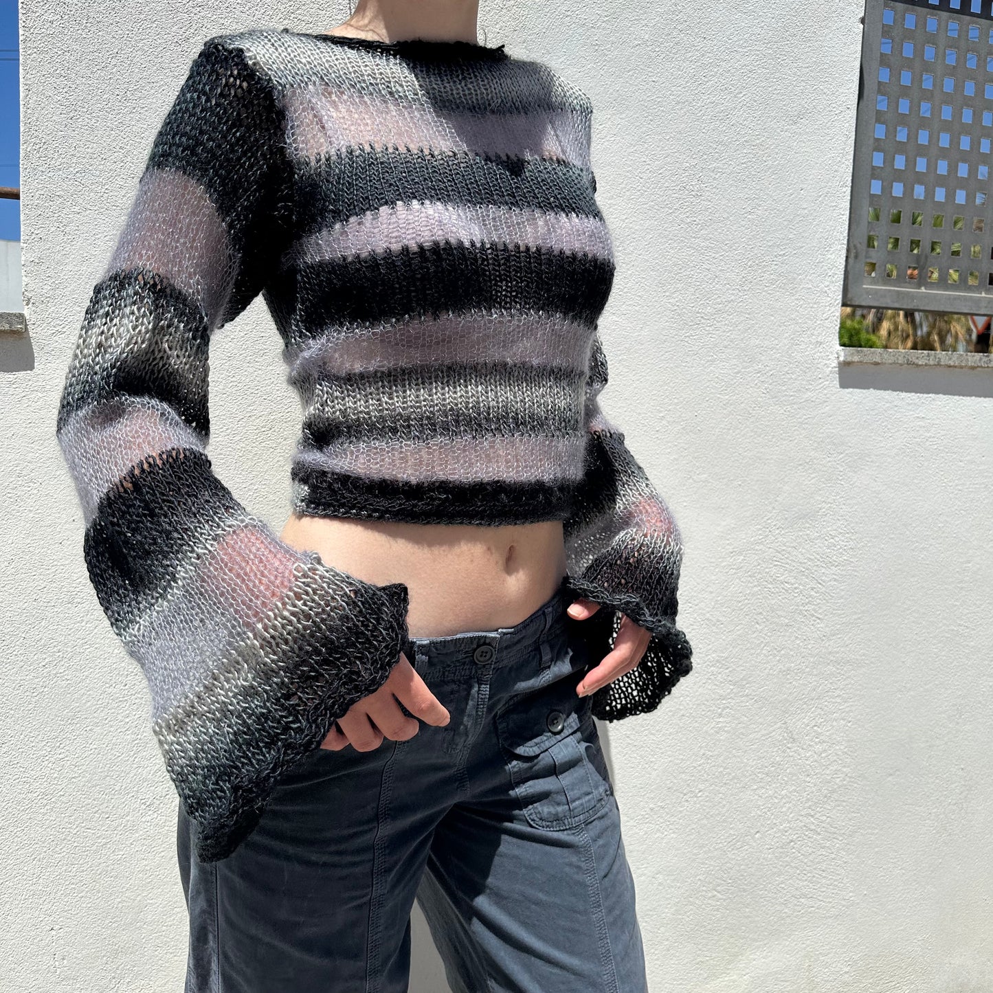 Handmade striped black and grey knitted mohair jumper with flared sleeves