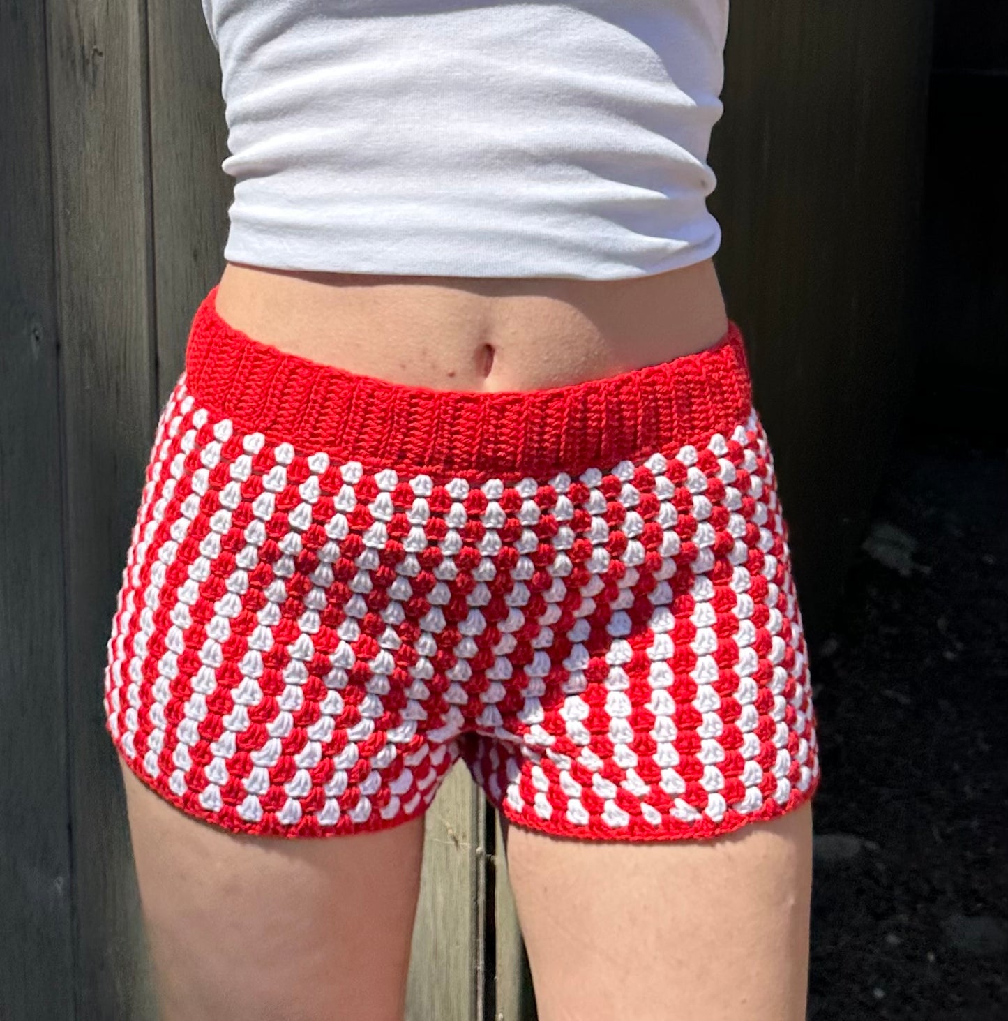 Handmade gingham crochet shorts in red and white