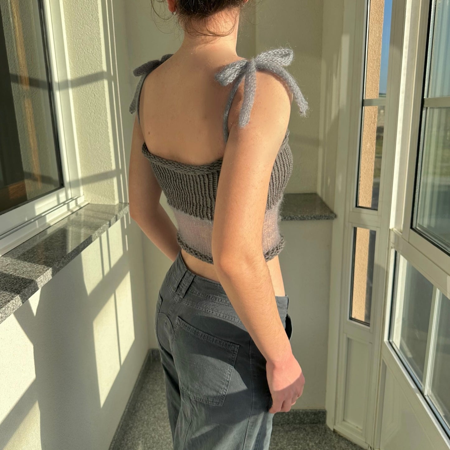 Handmade knitted mohair bow top in light and dark grey