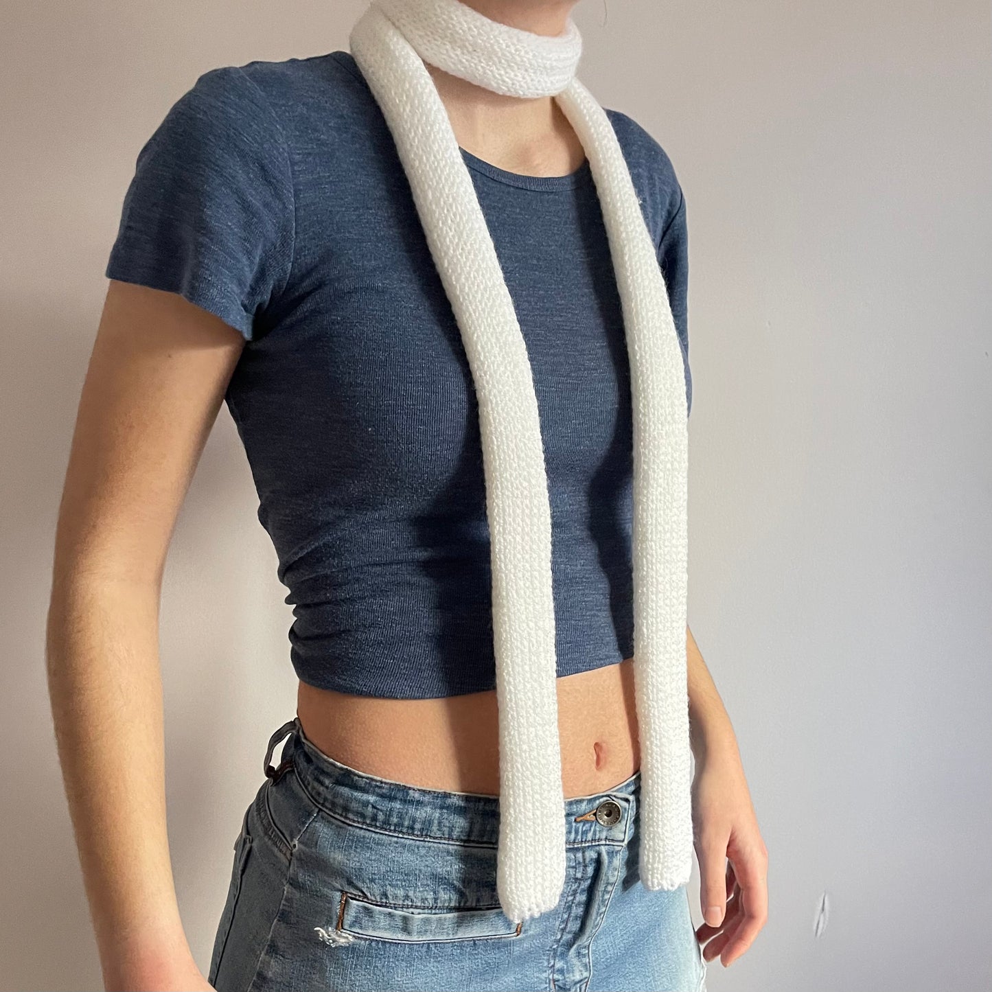 Handmade knitted skinny scarf in white