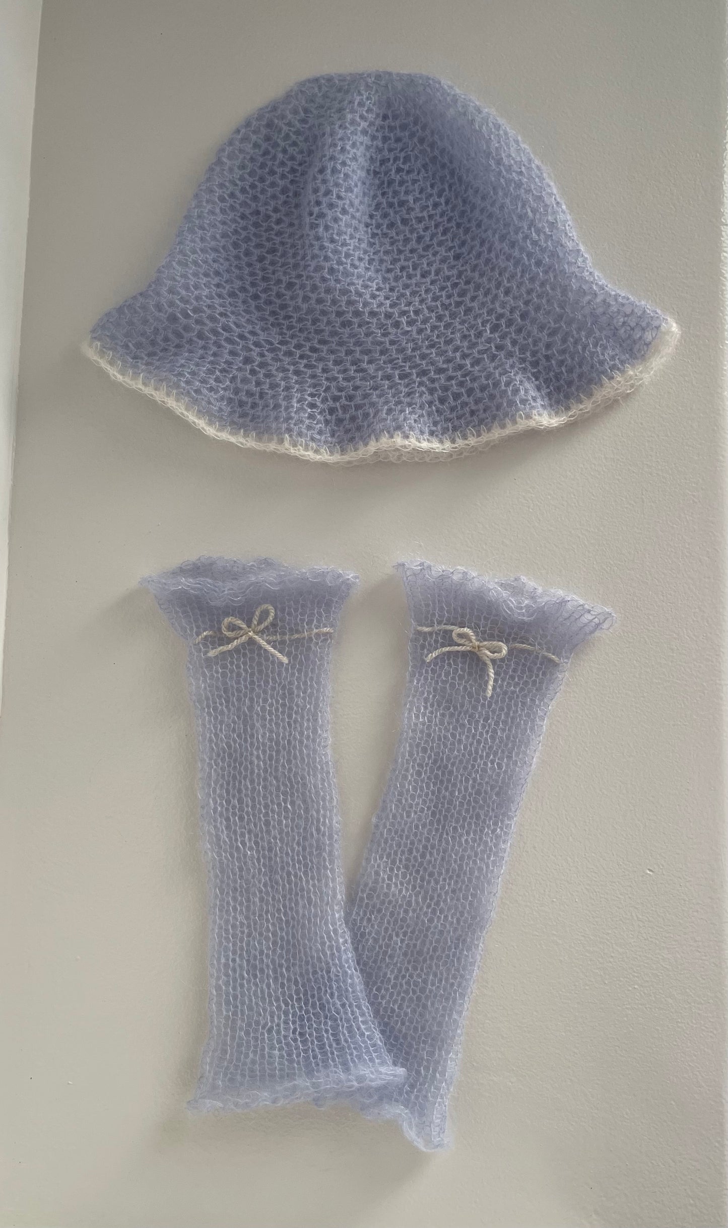 Handmade crochet mohair bucket hat in baby blue with cream trim