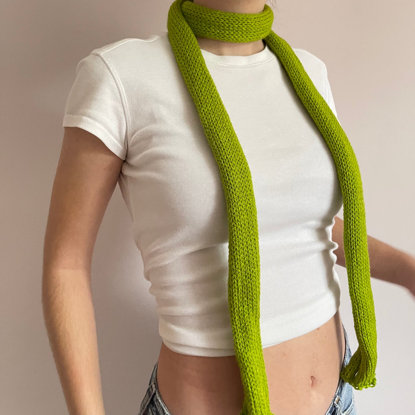 Handmade knitted skinny scarf in olive green