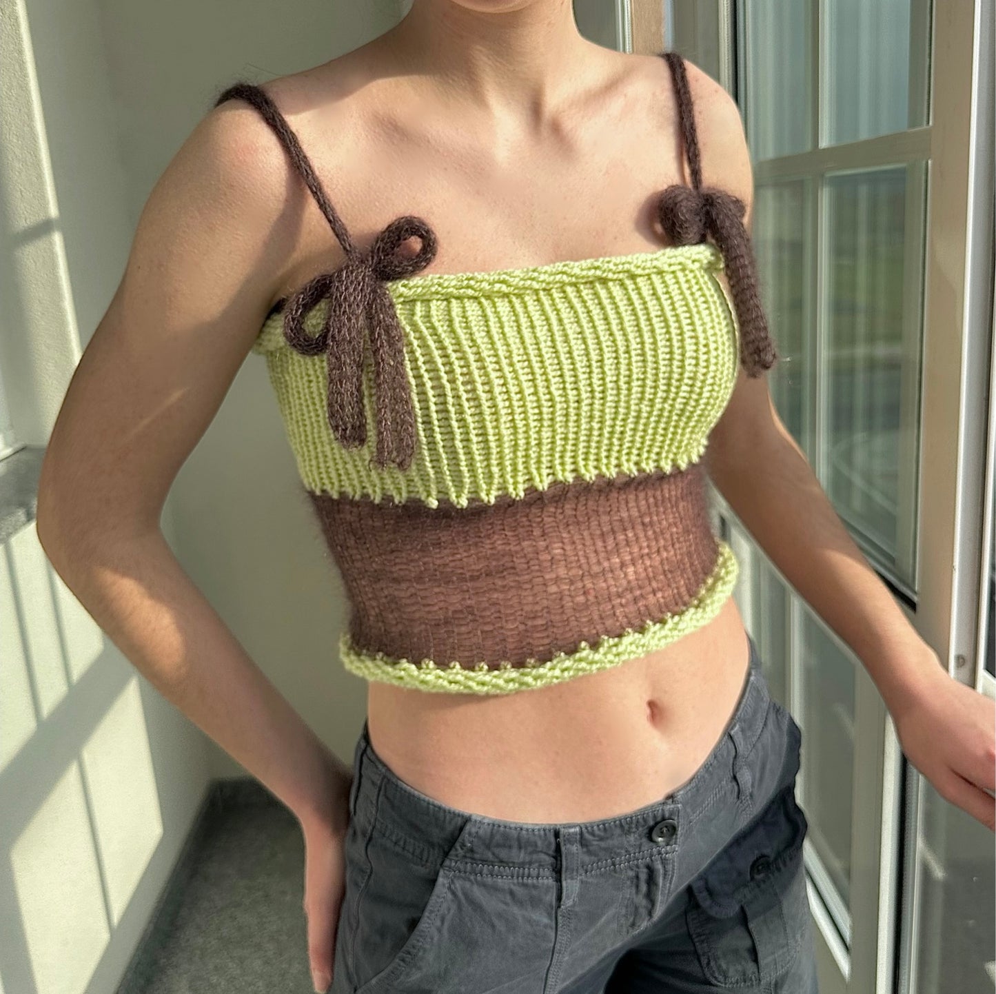 Handmade knitted mohair bow top in pastel green and brown