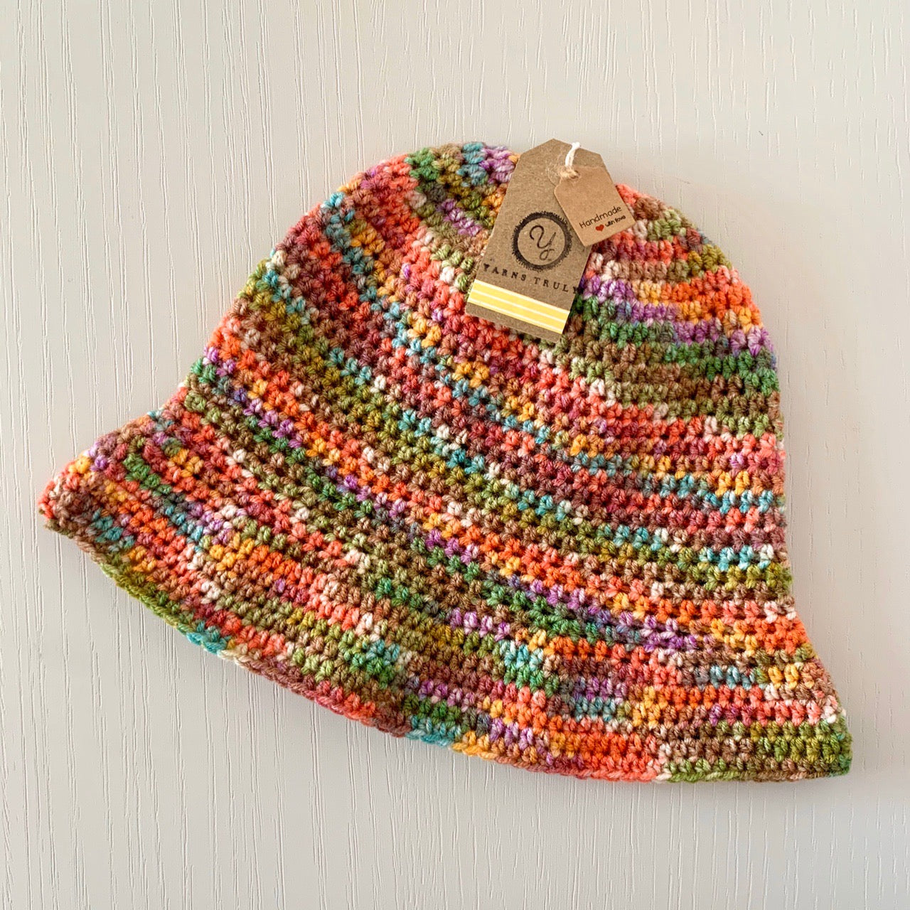 Handmade crochet bucket hat in Burnt Rainbow shades