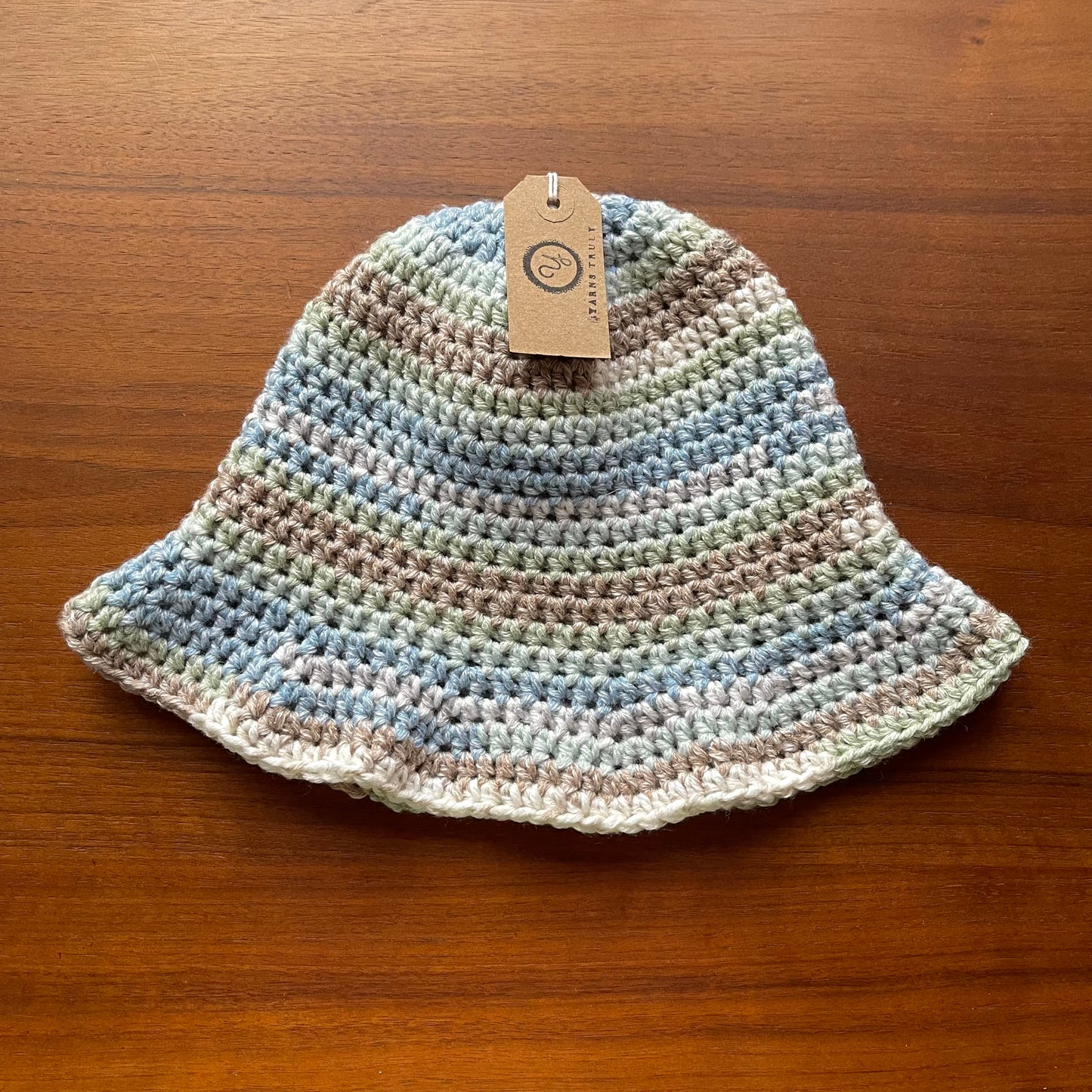Handmade striped crochet bucket hat in Beach shades