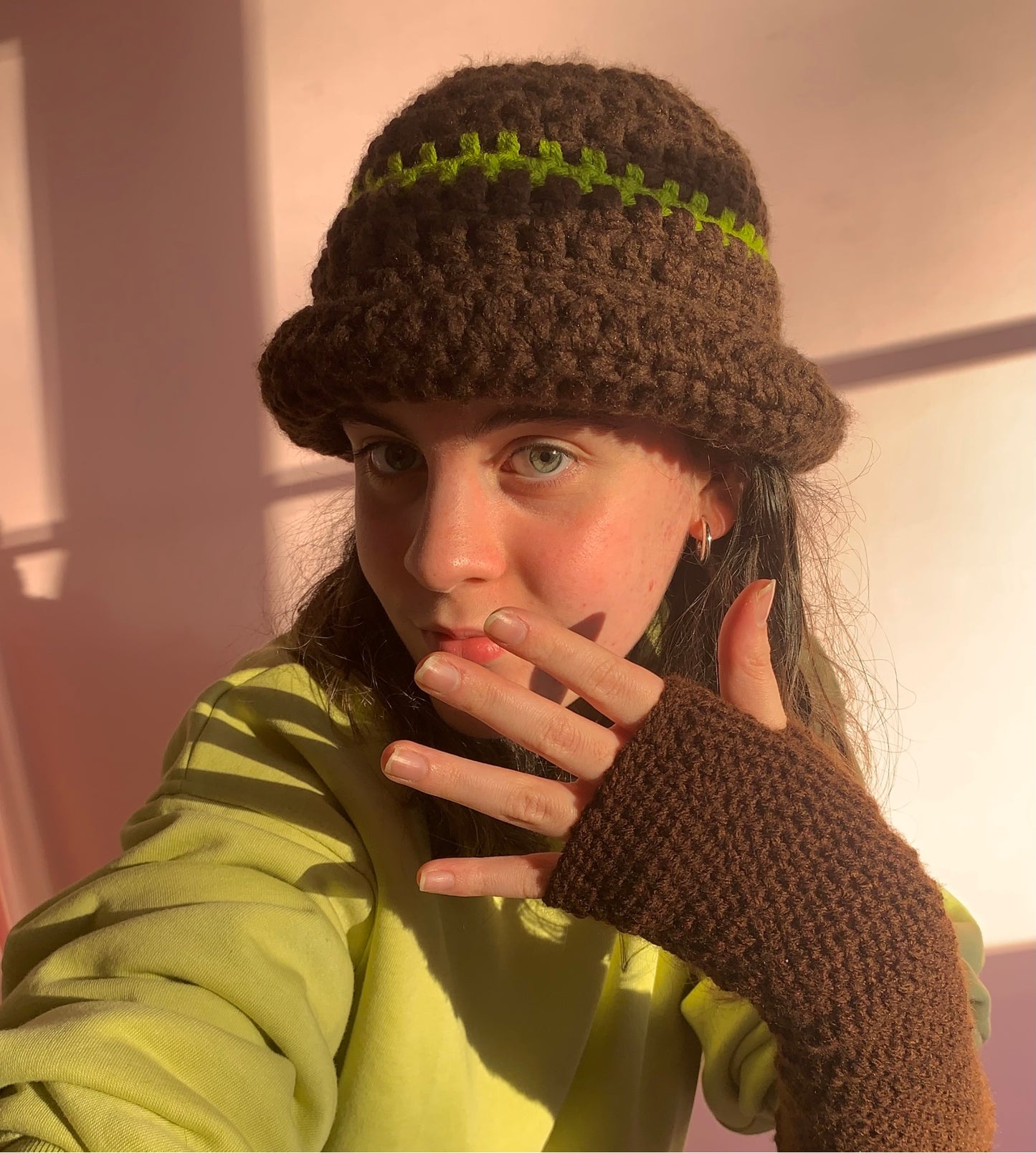 Handmade brown chunky crochet bowler hat with olive green stripe