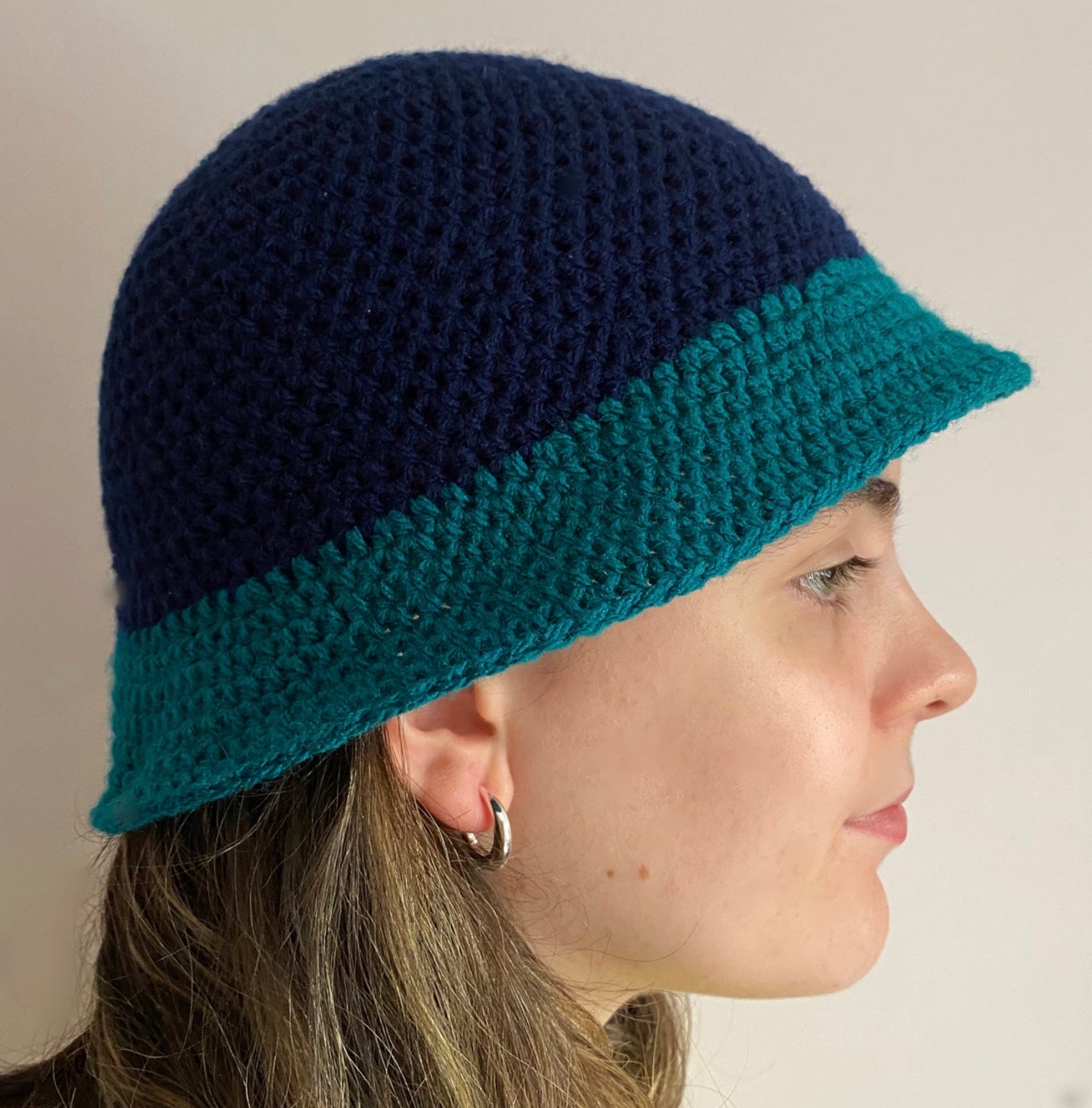 Handmade crochet colour block bucket hat in navy blue & teal