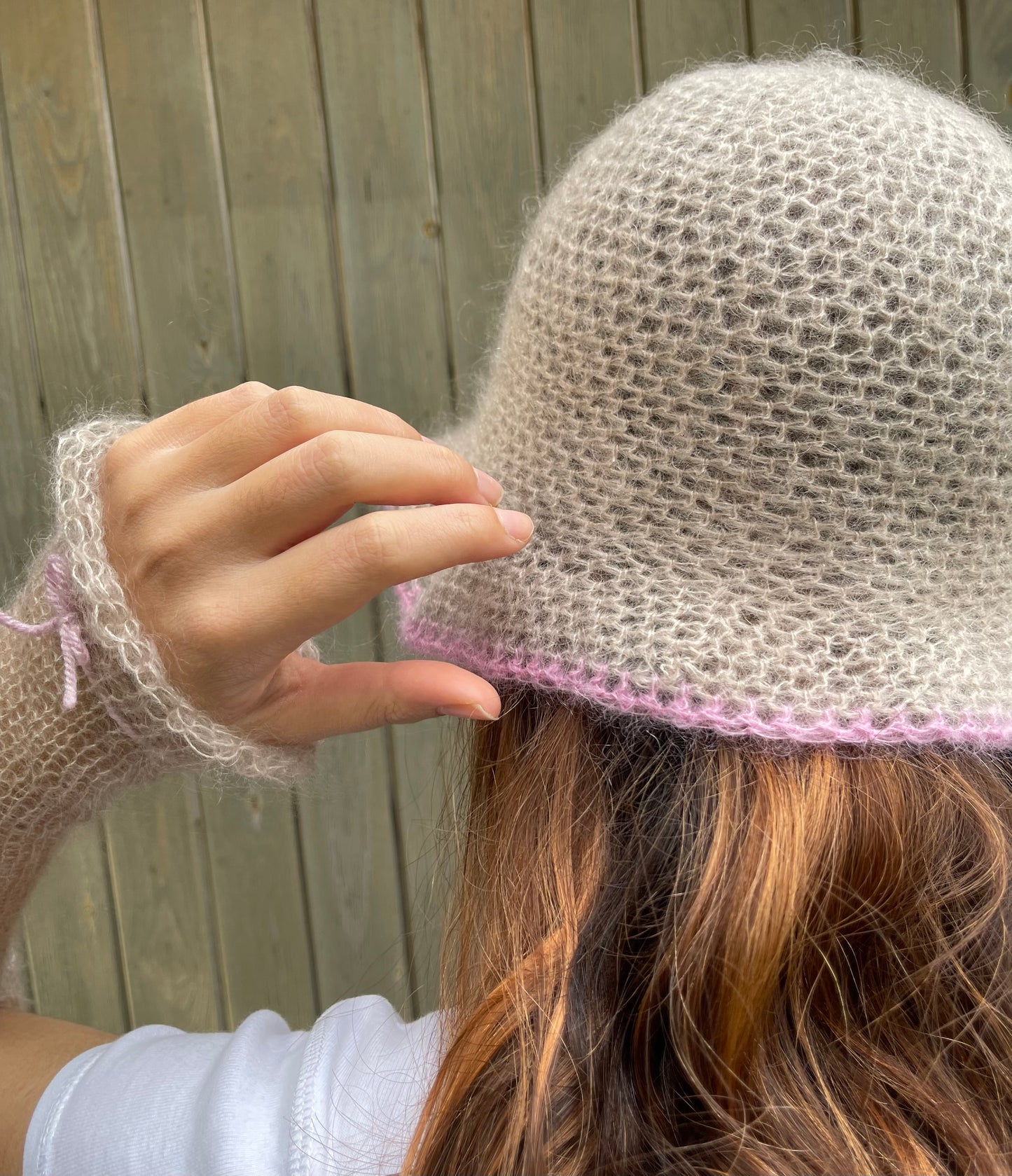 Handmade crochet mohair bucket hat in beige with baby pink trim
