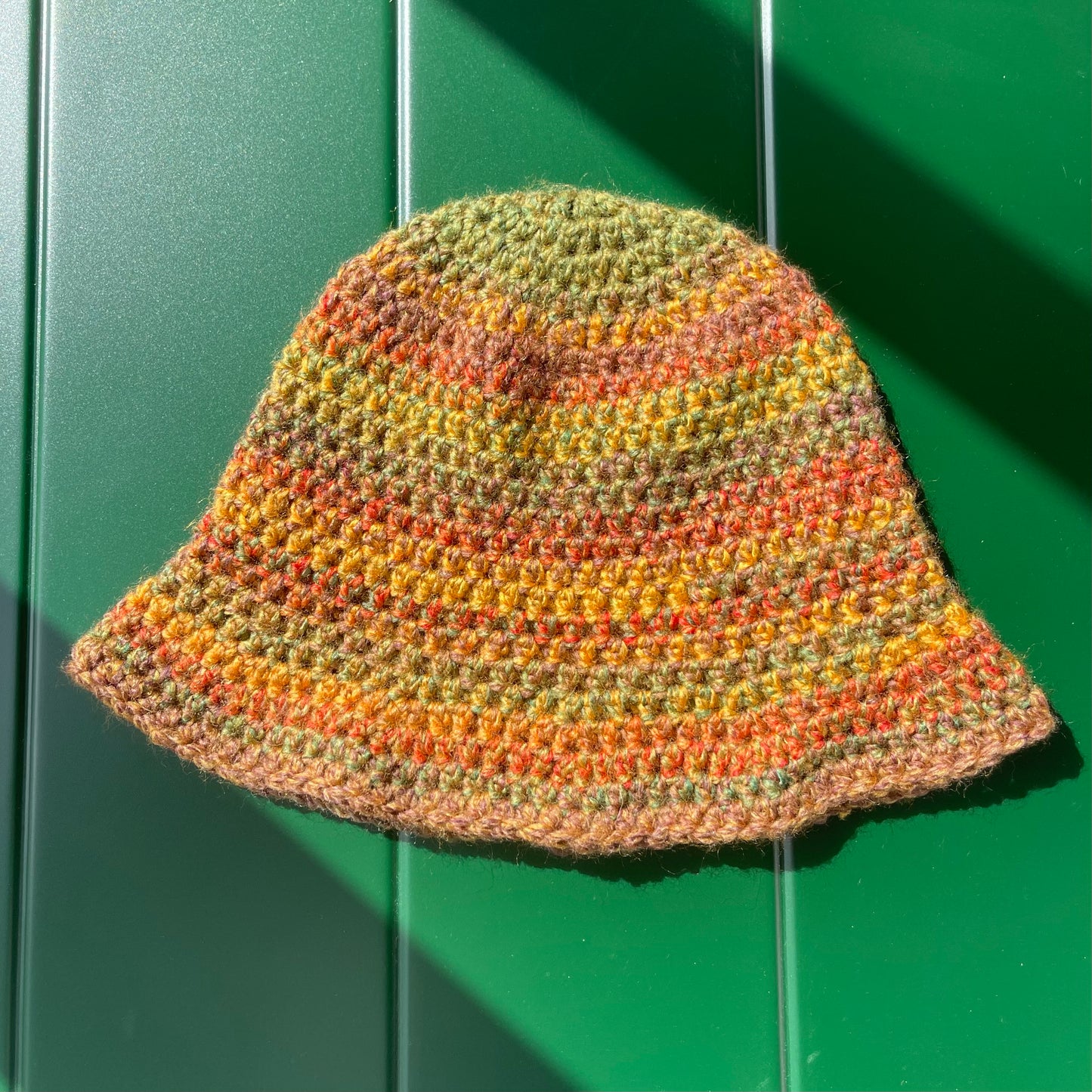 Handmade crochet bucket hat in earth tones colourway