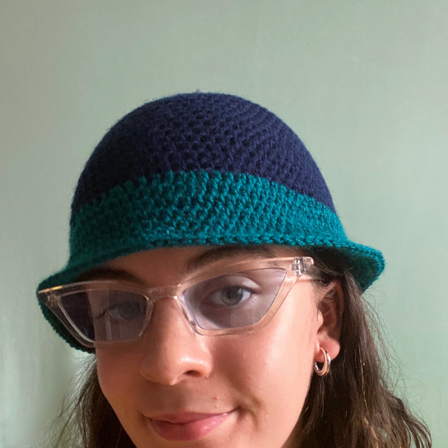 Handmade crochet colour block bucket hat in navy blue & teal