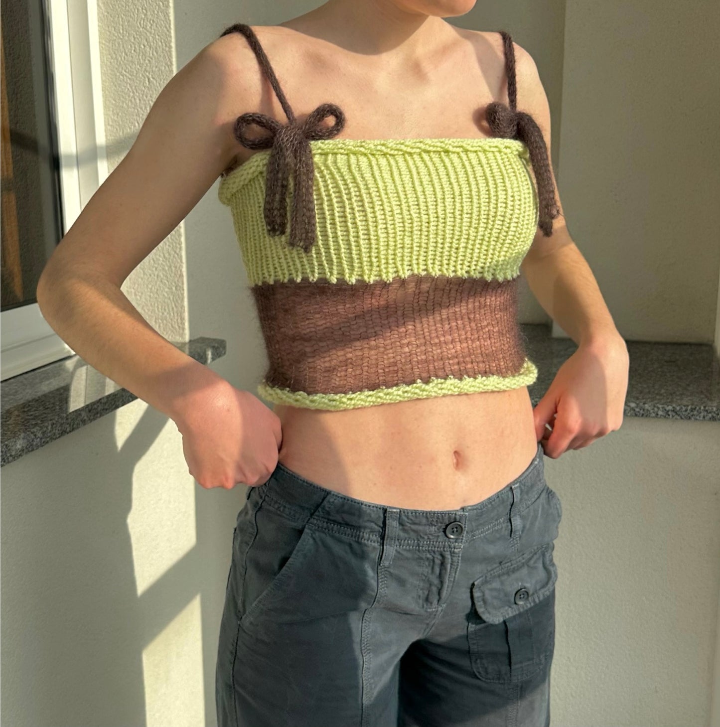 Handmade knitted mohair bow top in pastel green and brown