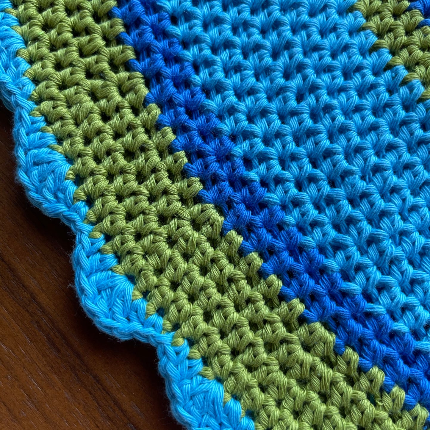Handmade cotton scallop edge crochet bucket hat in blue and green