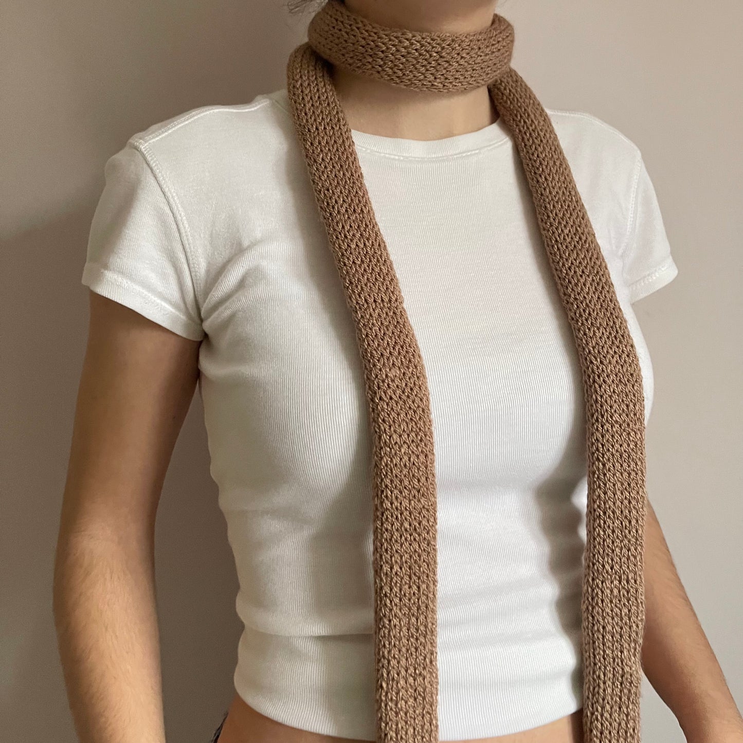 Handmade knitted skinny scarf in tan