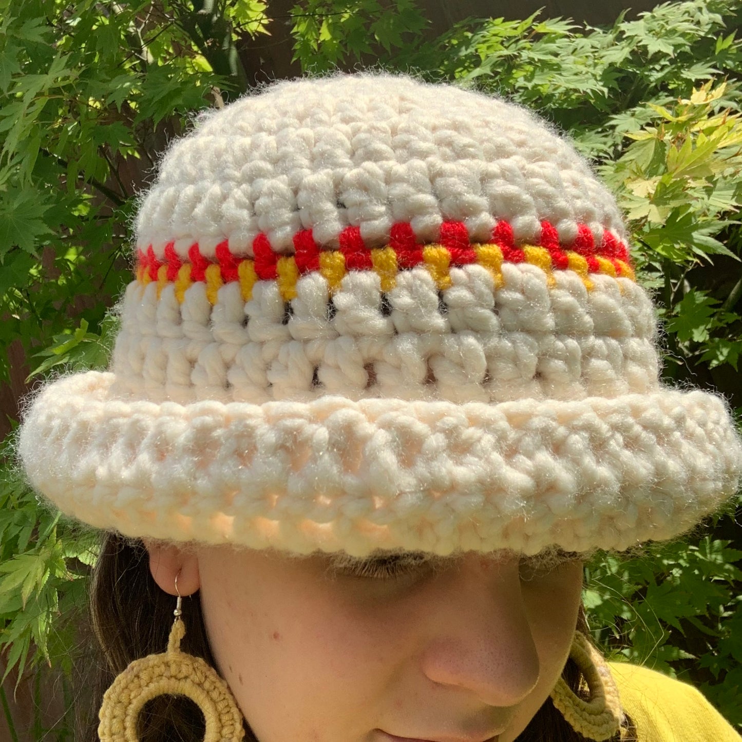 Handmade cream chunky bowler hat with red and yellow stripes