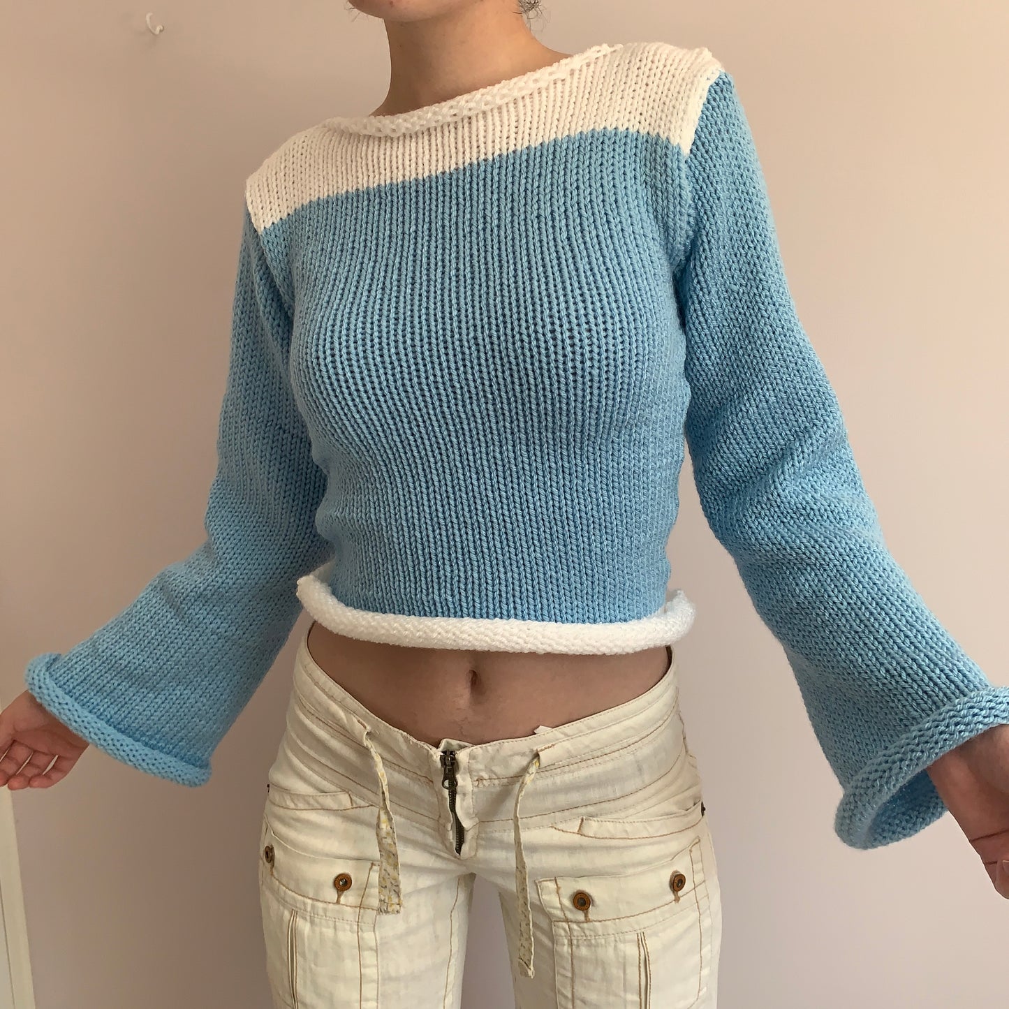 Handmade knitted colour block jumper in baby blue and white
