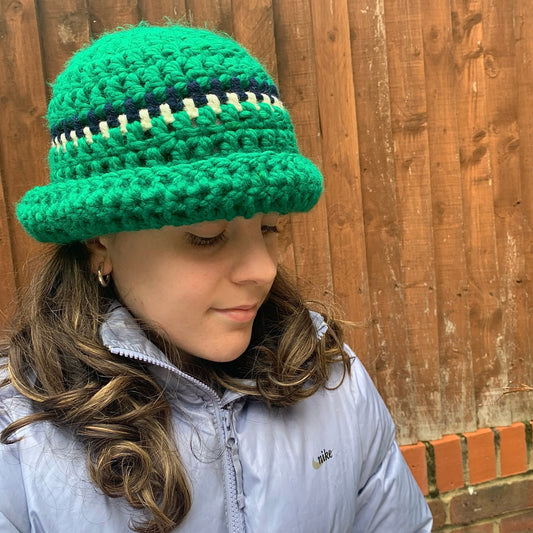 Handmade forest green chunky crochet bowler hat with cream and navy stripes