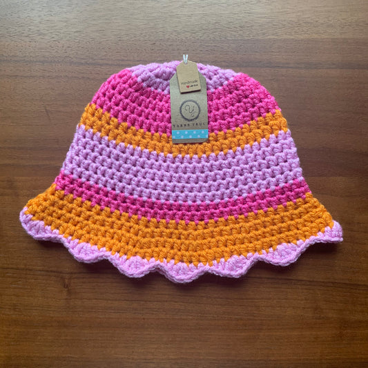Handmade scallop edge crochet bucket hat in orange and pink
