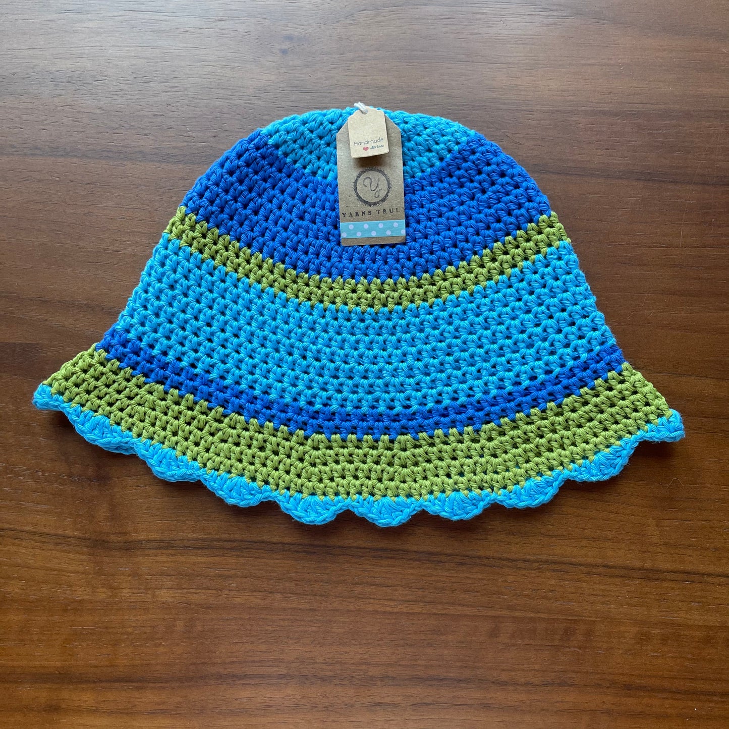 Handmade cotton scallop edge crochet bucket hat in blue and green
