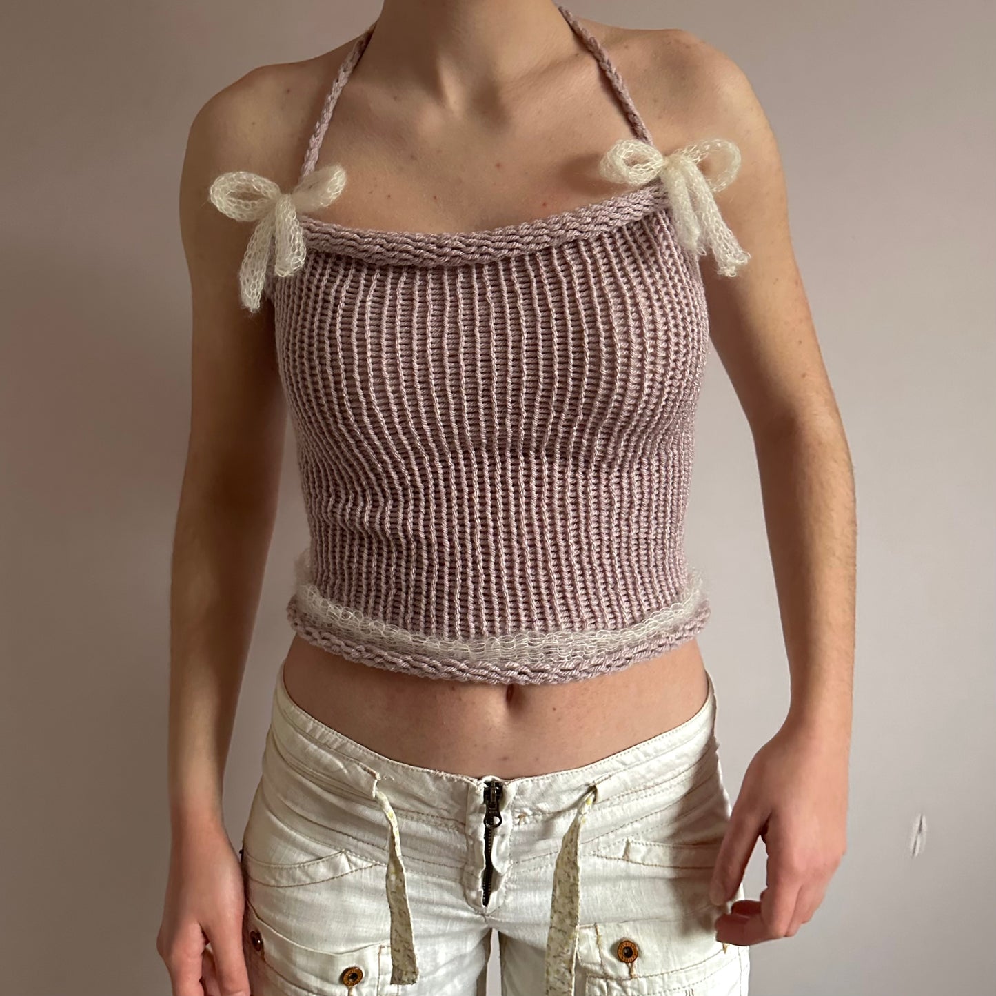Handmade knitted mohair bow top in dusky pink and cream