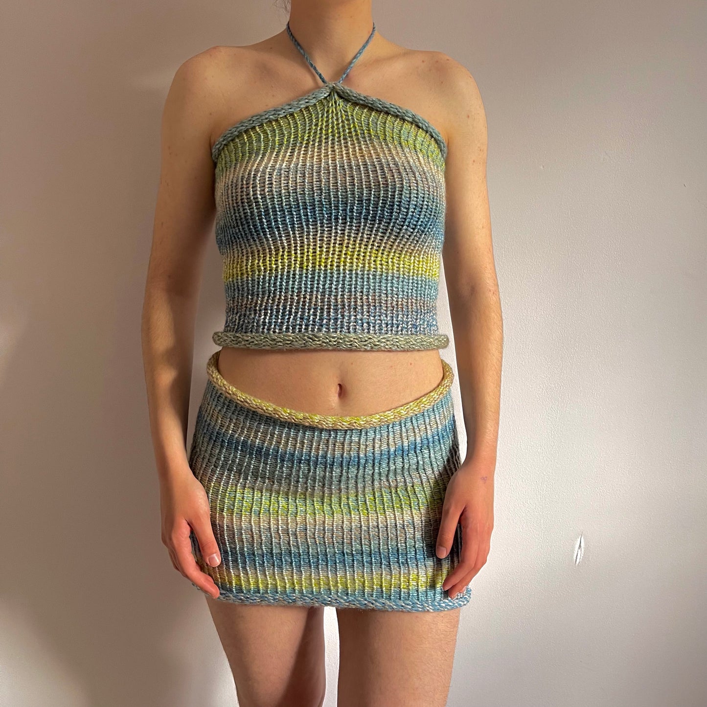 Handmade knitted mini skirt in green, beige, yellow and blue