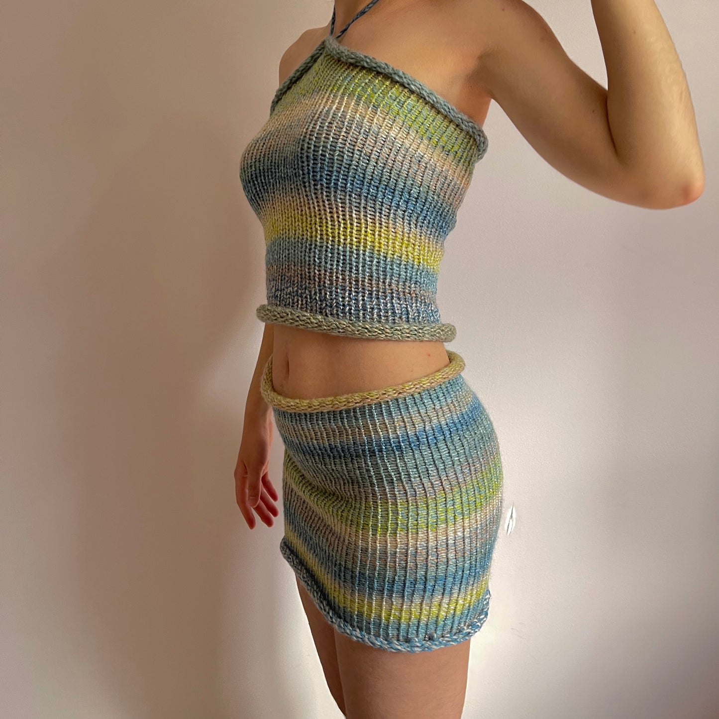Handmade knitted mini skirt in green, beige, yellow and blue
