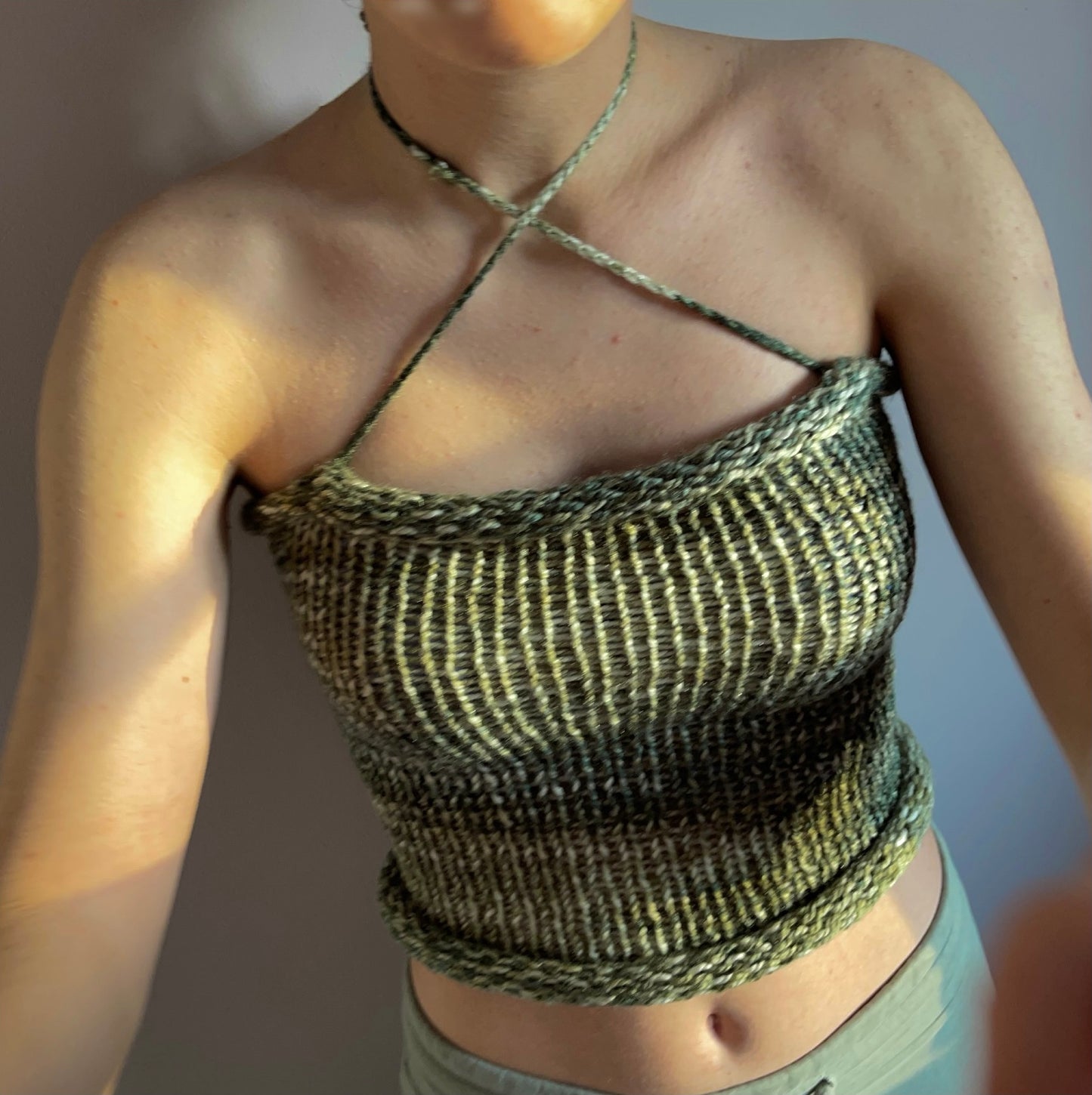 Handmade knitted criss cross halter top in green and cream
