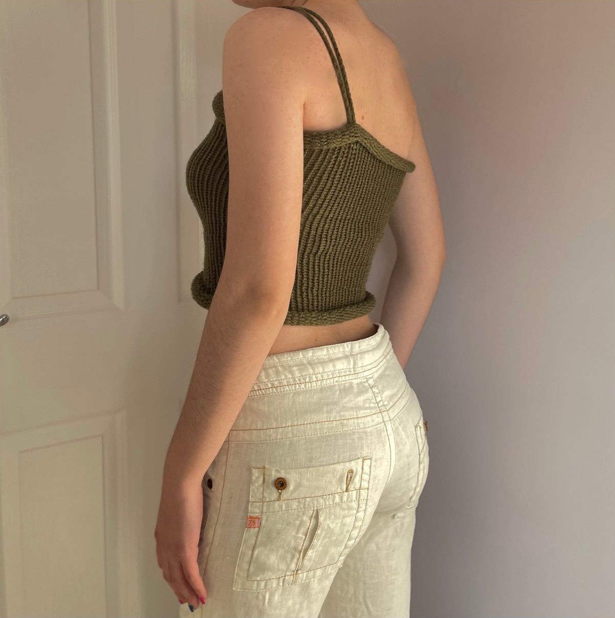 Handmade knitted asymmetrical top in khaki green