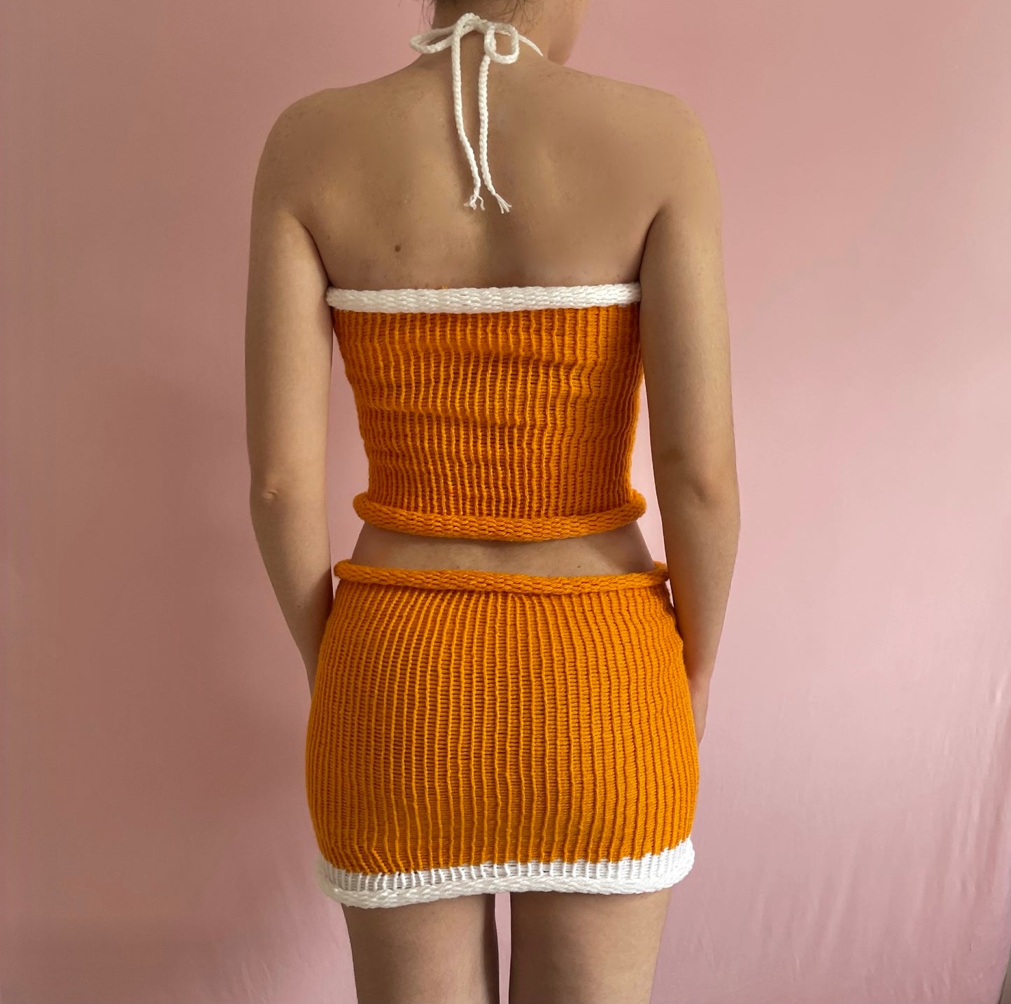 Handmade knitted colour block halter top in orange and white