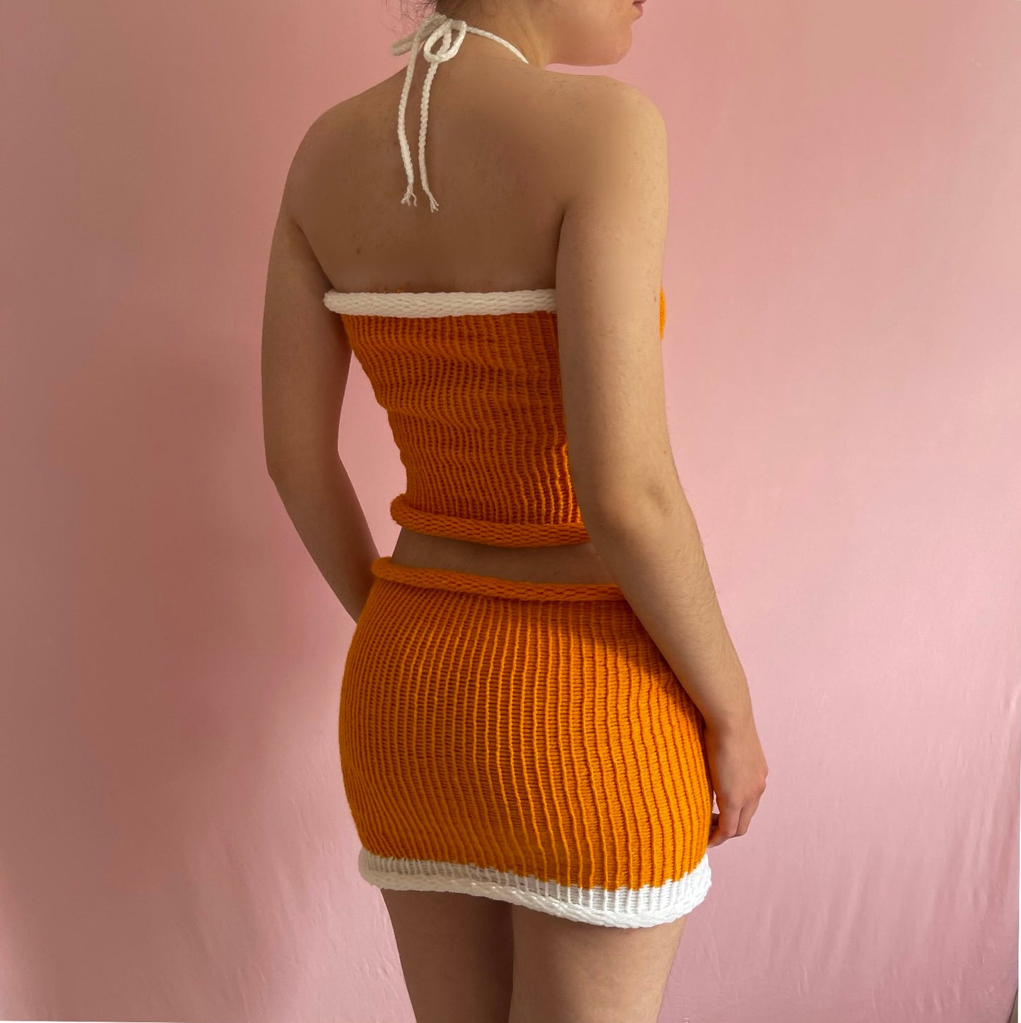 Handmade knitted colour block halter top in orange and white