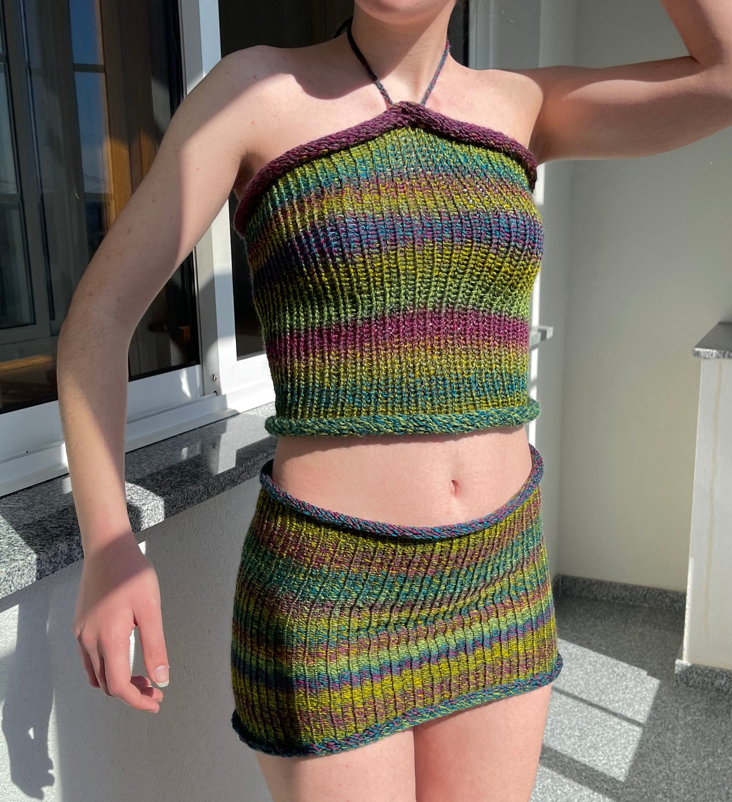 Handmade knitted halter neck top in green, purple and blue