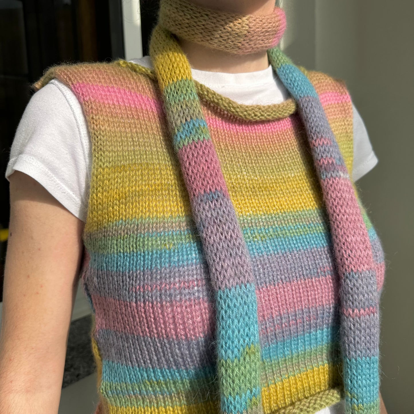 Handmade knitted ombré skinny scarf in dusky rainbow